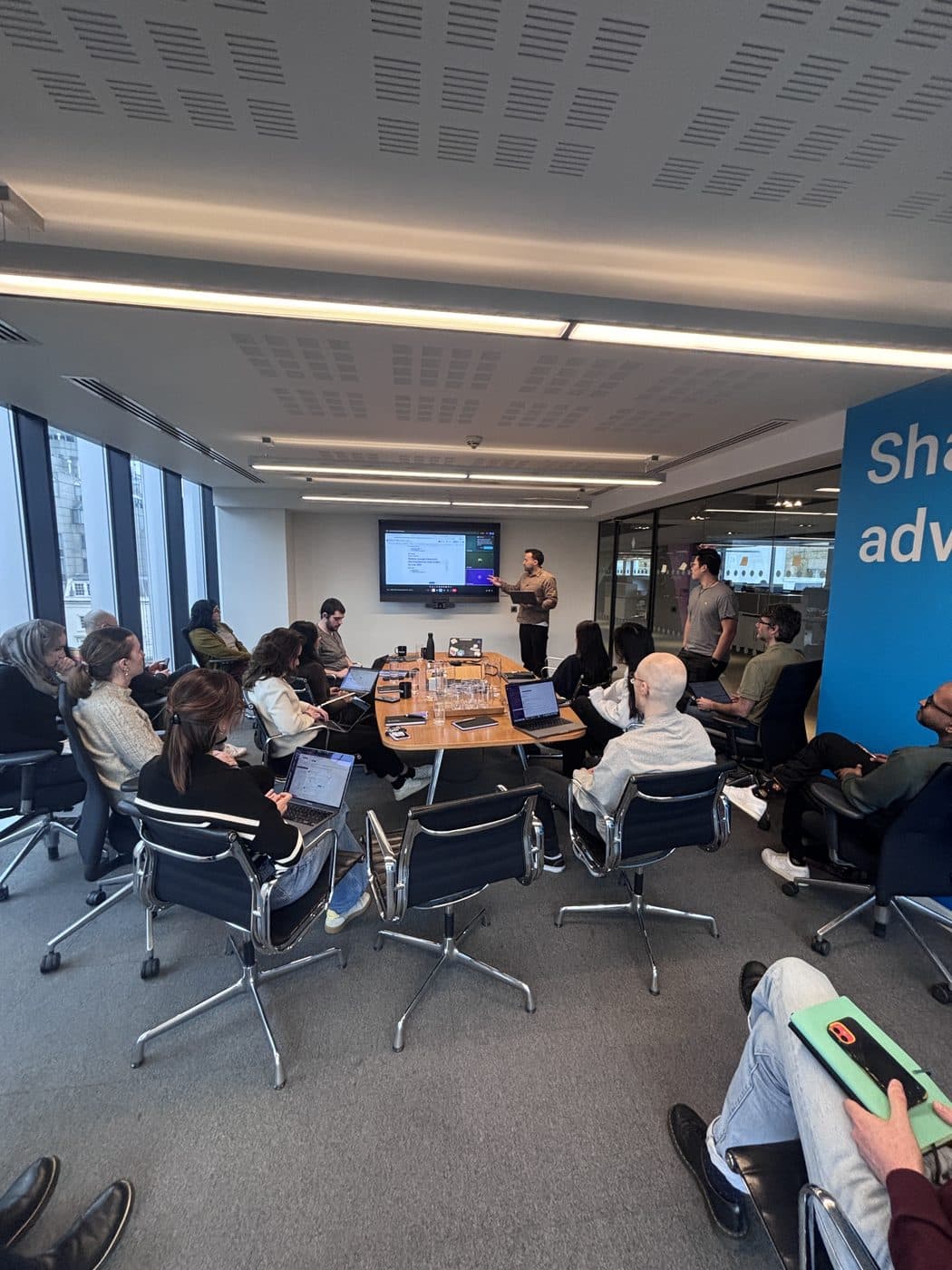 A facilitator walking a product team through a working session.