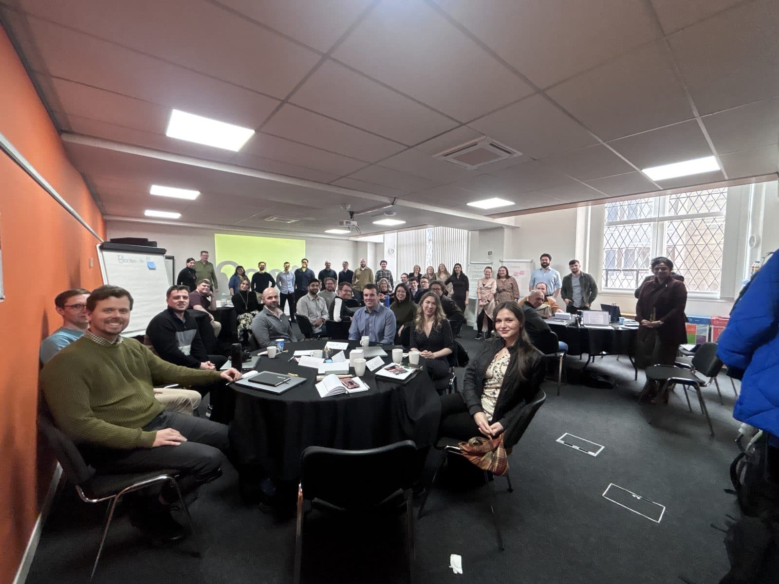 A product team together at a Colab Engage accelerator session.