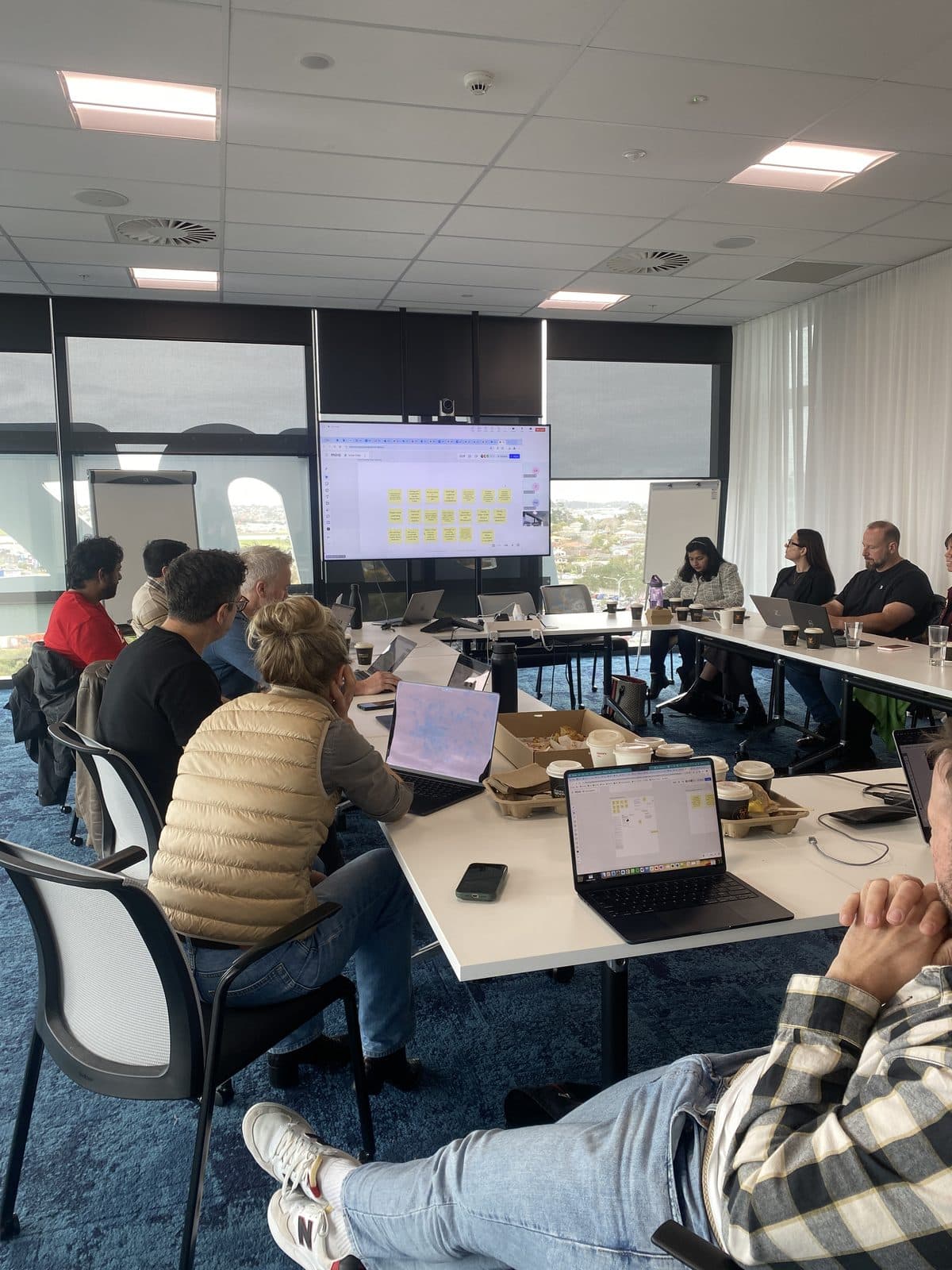 EROAD product managers working through discovery exercises in a hands-on accelerator session.